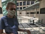 Samantha wearing mask, outdoors with cake