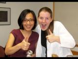 Two lab members giving the thumbs up