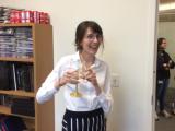 Kathryn holding a wine glass