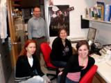 Four team members posing in lab