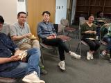 Ryan Hunter Dissertation Defense - attendees socializing