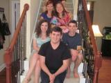 Six Lab Members on carpeted stairway