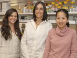 3 women in front of a lab bench