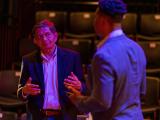 Dr. Trivedi talking with a conference attendee