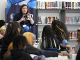 Ms. Harmony Hilton presenting to a classroom