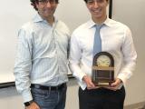 Mahmoud with Graduation Clock from Dr. Mendell