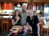 Annie and Willie Nelson autographing the “Stem Cell Guitar”