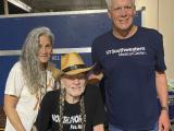 Eric Olson backstage with Willie Nelson