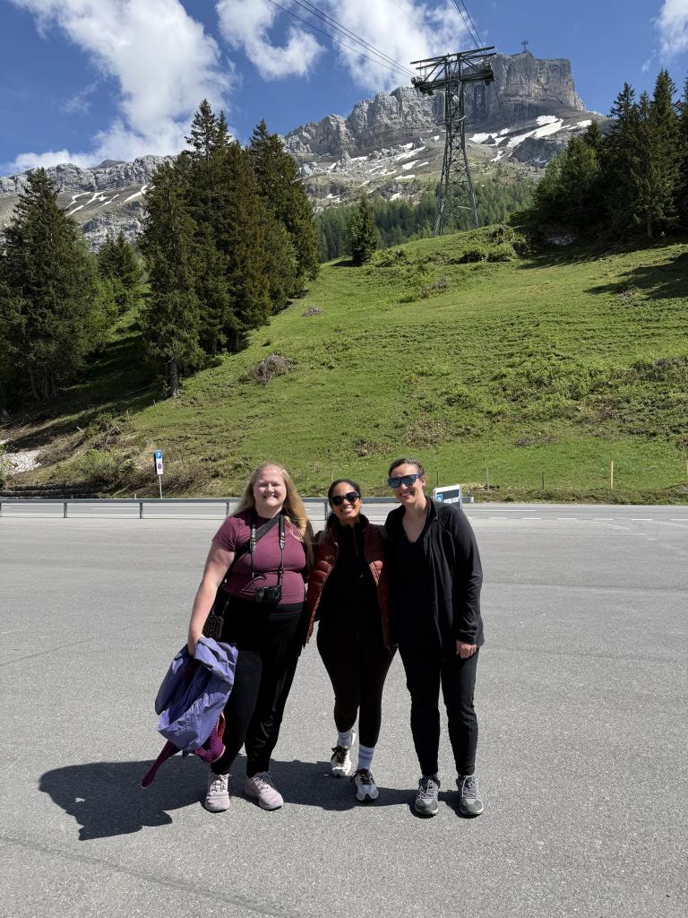 Dr. Routzong and two colleagues in front of mountains during (STEEM) conference