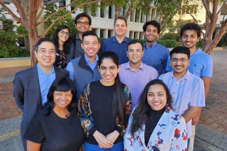 Cardiometabolic Research Unit lab members grouped together on the UTSW Seldin Plaza for a photo