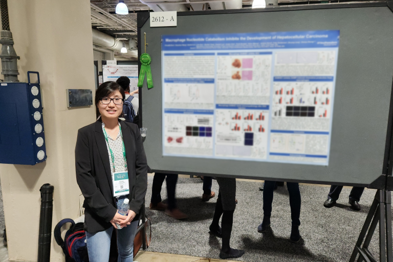 Chuanli Zhou, Ph.D. presenting her poster at AASLD Boston 2023