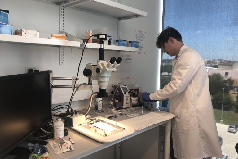 Lab Behind the Scenes: Micah Getting Ready for the Next Experiment