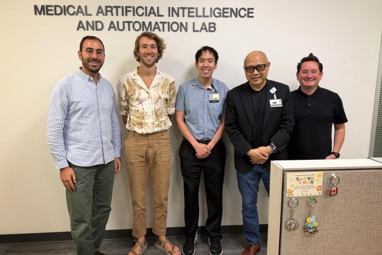 MAIA Lab members standing with OpenAI members.