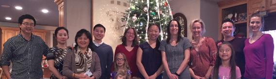 Lab members in front of Christmas Tree