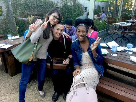 Shino Murakami at her Going Away Party, 2018, with two other team members