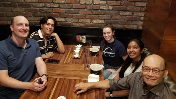 lab members at dinner