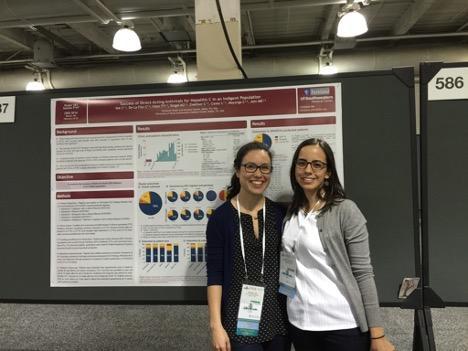 Carolina de La Flor and Christina Yek presenting their poster at a national meeting.