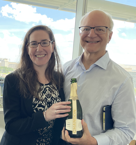 Caitlin Leedy and Dr. Bill Dauer celebrate Caitlin's dissertation defense.