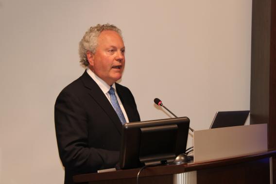 Dr. Quentin Clemens at a podium