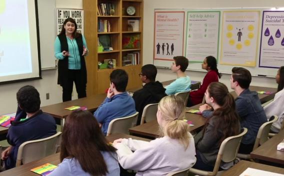 teacher presenting to students