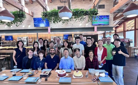 James Chen Lab group sitting at table