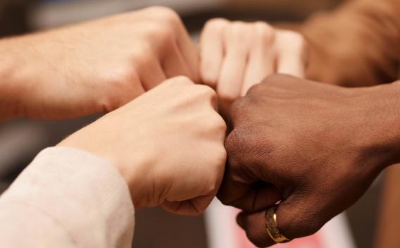 Multi-hand fist bump