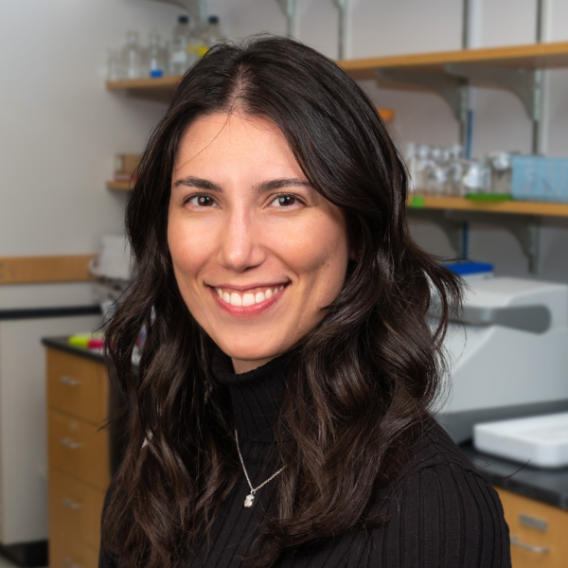 Rachelle Koch a student in the David Greenbeg Research lab wearing a black turtle neck sweater.