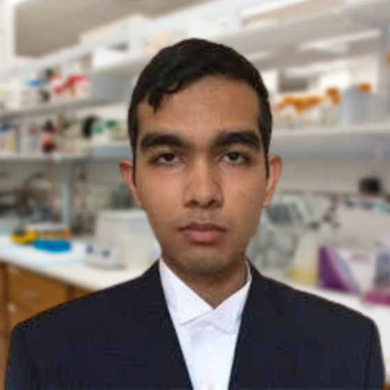 Kong Lab memeber Hemanth Karnati in a dark colored suit and white shirt