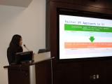 Dr. Rupali Kumar during her presentation at a podium