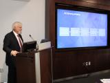 Dr. Brian Rolston during his presentation at the podium